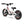 White Amped A10 Children's electric balance bike with black seat and red accents on a white background side